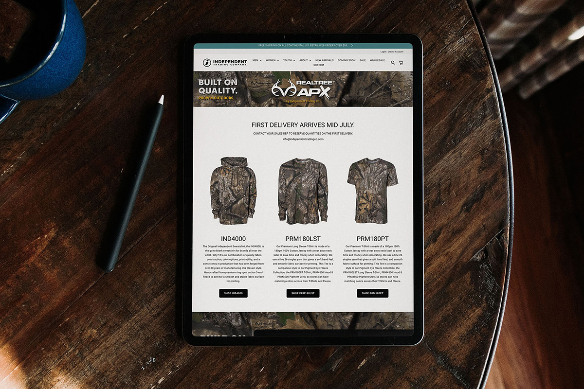 Realtree APX landing page on an iPad sitting on a tabel with a cup